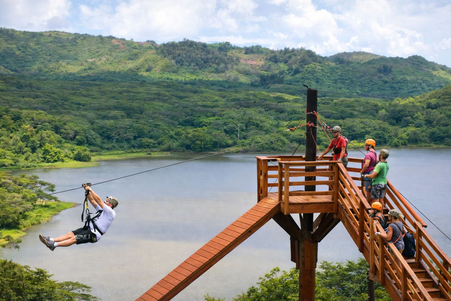 Kauai zipline tour over green valley